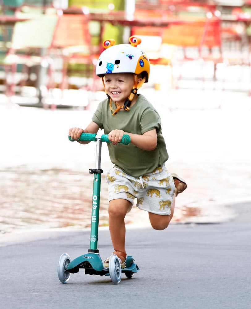 preschooler on his mini micro deluxe eco scooter