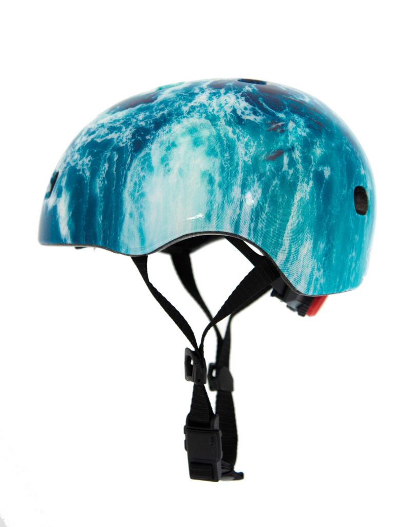 micro kids scooter bike helmet ocean side view