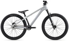 2026 Giant STP 26 dirt jump bike in Quicksilver with 26-inch wheels, Marzocchi Bomber DJ fork and single-speed setup for pump track and jump riding